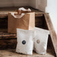 Wiederverwendbare Papiertragetasche aus reißfestem Papier, WC Reinigungspulver und Geschirrspülpulver aus Österreich